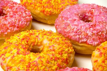 Iced Ring Donuts On A White Background