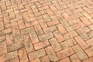 Texture orange old blick tile floor of sidewalk for background