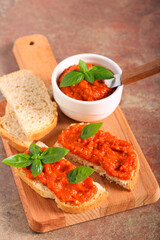 Roasted vegetables spread over bread slices