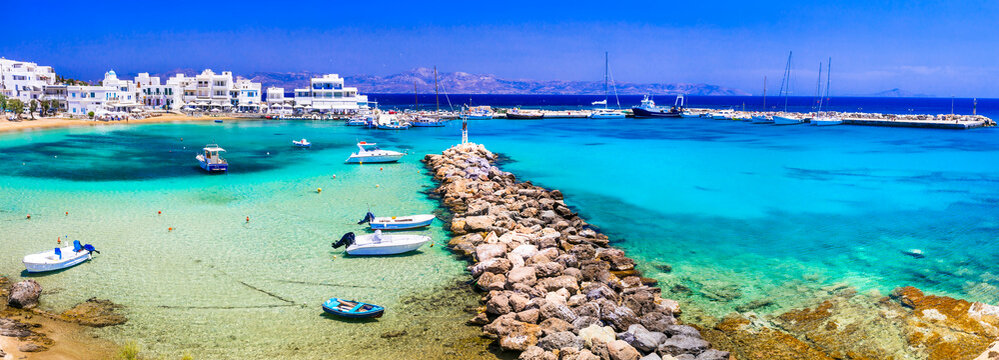Greece holidays, Cyclades, Paros island beaches and sea. Scenic tranquil coastal village Piso Livadi with turquoise sea