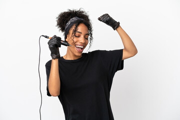 Tattoo artist latin woman isolated on white background celebrating a victory