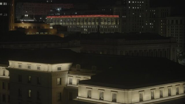 A night shot view of a downtown, with some commercial buildings, rooftops and few lights, a 4K (S-Log) video clip, June 14th, 2021, Cleveland OH, United States.