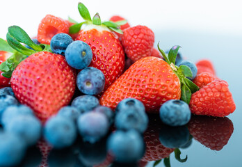 Fototapeta na wymiar berries. organic fruit, still life of ready-to-eat fruit, strawberries, blueberries and raspberries