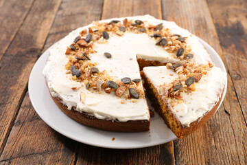 traditional carrot cake with cream and nuts