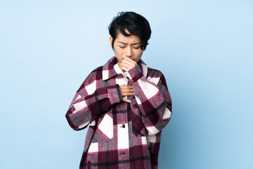 Young Vietnamese woman with short hair over isolated background coughing a lot