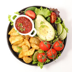 roasted potatoes, avocado and vegetables salad