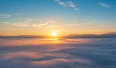 Fototapeta na wymiar Beautiful morning Sunrise and Fog flow over mountain in Ai yerweng, Yala, Thailand