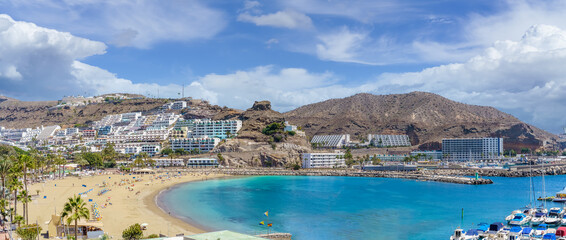 Fototapeta na wymiar Landscape with Puerto Rico village and beach on Gran Canaria, Spain