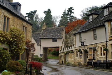 Houses covered in ivy in Castle Combe, England