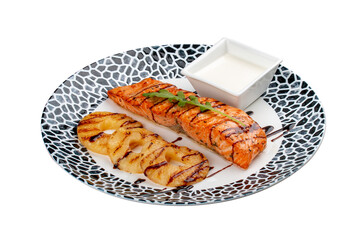 Salmon with cream sauce and grilled pineapple. On a white background