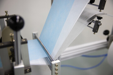 The medical face mask production machine. 