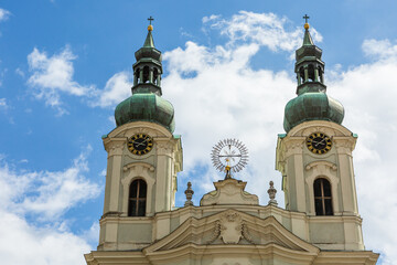 Fototapeta na wymiar Domes of the Catholic Church of St. Mary Magdalene in Karlovy Vary