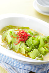 Delicious Chinese dish, boiled bitter gourd in broth