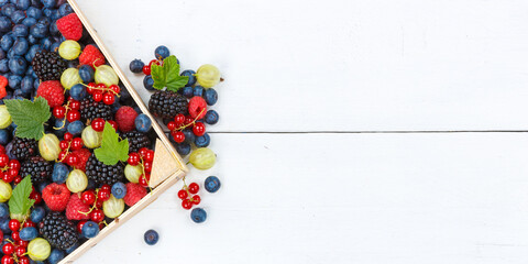 Naklejka na ściany i meble Berries fruits berry fruit strawberries strawberry blueberries blueberry with copyspace copy space panorama in a box