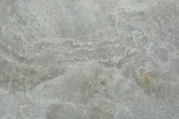 Dark gray textured decorative background of plaster with space for text