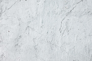 Texture of a concrete wall with cracks and scratches which can be used as a background