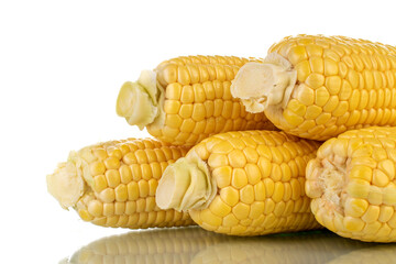 Several peeled ears of corn, close-up, isolated on white.