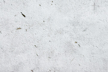 Texture of a concrete wall with cracks and scratches which can be used as a background