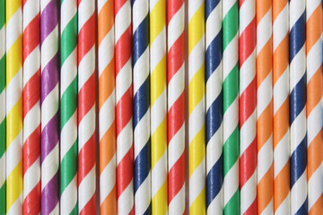Colorful Striped Paper Straws Background Close up