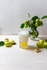 Apple cider sparkling in glass on white background