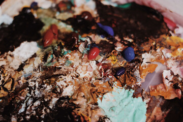 Close up detail of multicolored abstract painter paint