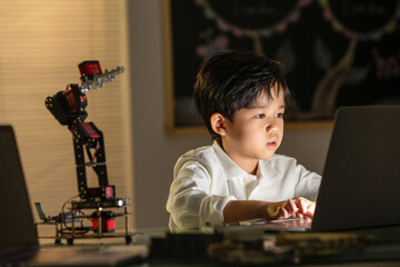 Students learning robot programming
