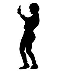 Fototapeta premium Young woman holds smartphone in her hand. Isolated silhouettes of people on a white background