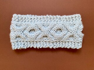 hand made headband featuring knitting stitch with lovely cable pattern 