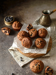 Fototapeta na wymiar blueberry muffins and coffee on plate