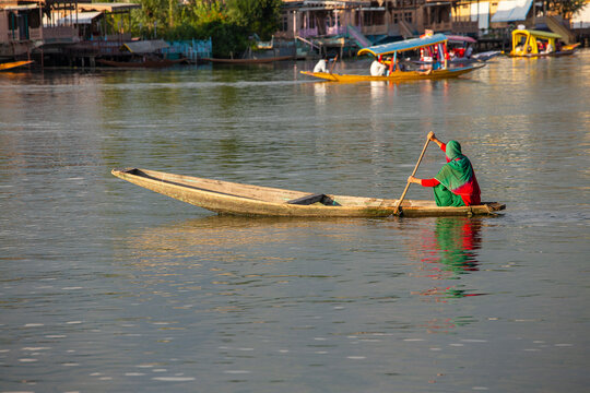 Lifestyle in Dal lake, local people use Shikara, a small boat for transportation in the lake of Srinagar, India