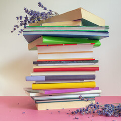 Autumn. Stack of books and dry flowers of lavender  on table