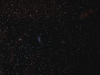 Fototapeta premium picture space Starry night sky as a background. Dark interstellar. Horizontal orientation.