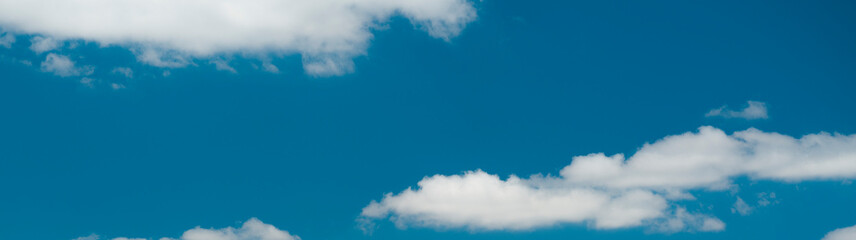 white clouds in the blue sky 