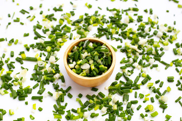 Chopped spring onions on white background