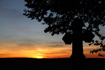 German sunset at the cross