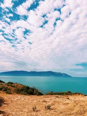 Foto auf Alu-Dibond Beautiful view of a calm sea and sky © Vesa Durguti/Wirestock