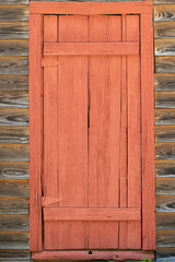 Obraz na płótnie Canvas Old red wooden door