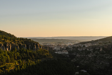 Sunset over the city in the mountains