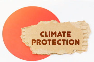 On the flag of Japan lies a notebook with the inscription - Climate protection