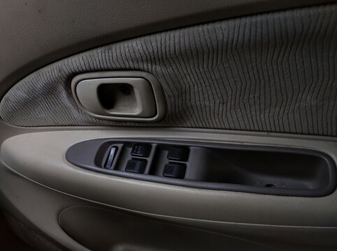 Panel in the car to open or close car doors and windows