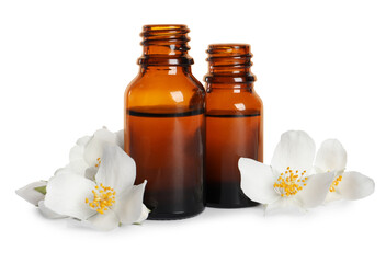 Jasmine essential oil and fresh flowers on white background