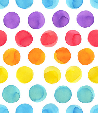 Seamless repeatable pattern of rainbow watercolor polka dot motive. Hand painted splashy drawing on white. Bright creative backdrop for design decoration, scrapbooking, card, invitation, wall decor.