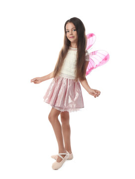 Cute little girl in fairy costume with pink wings on white background
