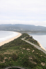 Obraz premium View from the lookout at The Neck Bruny Island over the beach with cloudy skies. Tasmania Australia