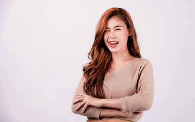 Obraz premium Close-up photo of an amazing long and sexy woman with long hair. Cute Asian woman smiling bright facial expression isolated on white background.