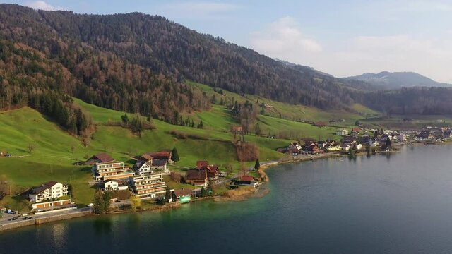 Aerial drone footage of the Morgarten village along the Ageri lake in Canton Schwyz in Switzerland. The place is famous for an historical battle in 1315 leading to the country creation. 