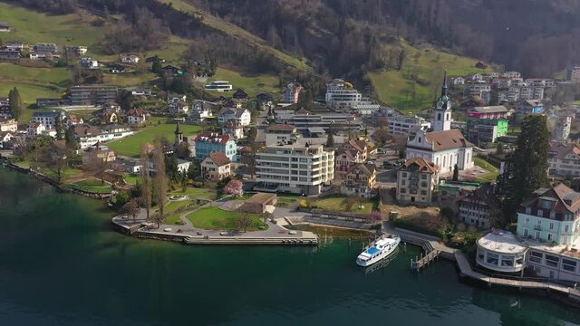 Aerial drone footage of the authentic Vitznau village by lake Lucerne in Switzerland