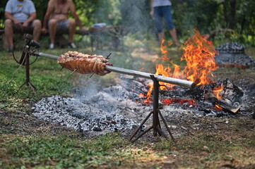 Pork meat baked on a spit