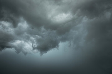 Dramatic storm clouds in rainy season, Black and dark sky with clouds