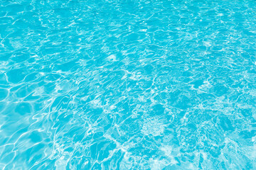 Fototapeta na wymiar purified water surface and motion, Selective focus water surface in swimming pool